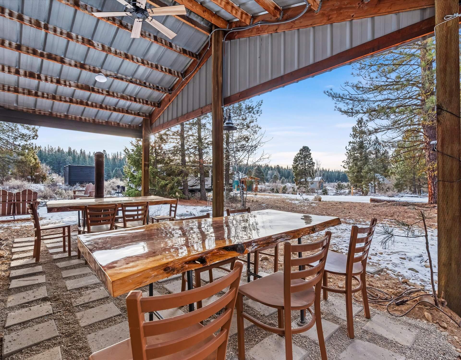 Clubhouse outdoor eating area and view overlooking campground